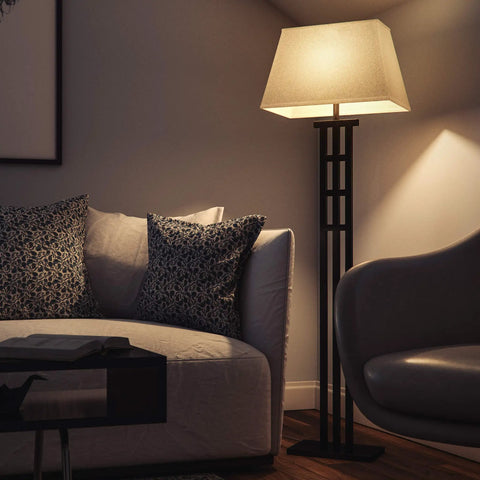 McIntosh Floor Lamp in Bronze Finish With Geometric Mission Design, 58 Inch Tall, next to a sofa in a cozy living room setting