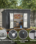 6x10 Ft Outdoor Storage Shed Galvanized Metal With Lockable Door And Vents displayed in a garden with open doors, showing interior organization.