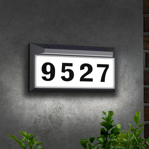 Solar Powered Address Sign With Bright LED House Numbers, Outdoor Waterproof Plaque on gray wall at night