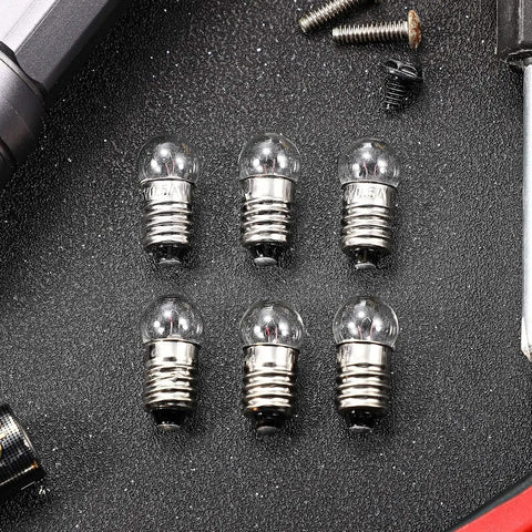 50 Pack E10 Miniature Screw Base Light Bulbs 3.8 Volt 0.3 Amp Mini Pilot Lamps arranged on a textured black surface.