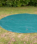 Trampoline Weather Cover 15Ft Round All Season Protection No Fuss Waterproof PVC Shield For Winter Rain And Sun Easy Install Outdoor Cover For Family Backyards visible on grass