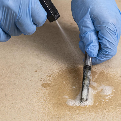 Applying Blade And Bit Cleaner For Tools 18 Fl Oz Resin Pitch And Rust Remover on metal tool with foaming action