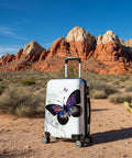Luggage: 20-inch carry-on with butterfly print, white hardside and spinner wheels.