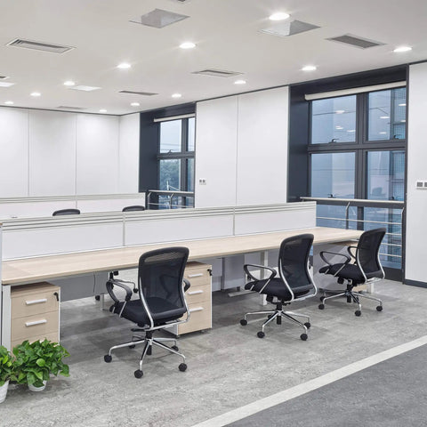 Office space with 9.8W LED Downlight Retrofit Kit 5-6 Inch, 3000K Warm White, showing ceiling lights and workstations.