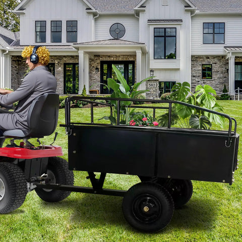 Man driving ATV with Rugged 1500 Lb Steel Dump Cart for Lawn and Garden with Removable Sides