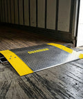 Built Tough Aluminum Dock Plate 48 By 48 Inches Handles 2600 Lb Loads Zero Fuss Bridge positioned over loading dock.
