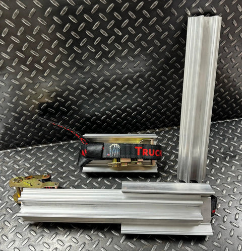 Emergency Tire Traction Aid With Extender Bars For Light Trucks To Medium Commercial Vehicles Universal Grip Upgrade displayed on metal background