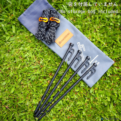 Heavy Duty Tent Stakes 12 Inch Pack Of 4 With Camp Rope Guy Lines And Storage Bag on grass