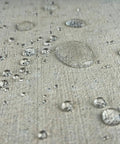 Droplets of water on a treated concrete surface showcasing Hella Tough Water Repellent Spray For Concrete Brick Stone Stucco Wood Deck Fence Ready To Use Breathable Clear Film Blocks Moisture Guards Pavers Boat Docks One Gallon Size Rock Solid Durability.
