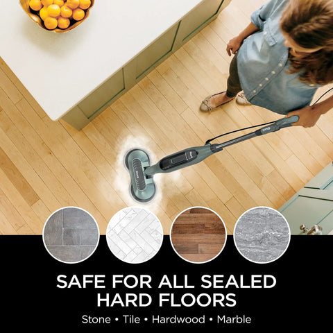 Person cleaning hardwood floor with Dirt Grip Steam And Scrub Pads Kit For Sealed Hard Floors With Soft Scrub And Dusting Washable Pads