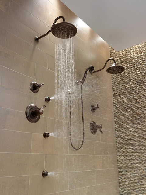 Cassidy Single Lever Bath Diverter and Transfer Valve Handle Kit in Venetian Bronze installed in modern shower