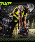 Worker in a hard hat and safety vest using Tough As Nails Fingerless Work Gloves For Men And Women Featuring Padded Palms Rock Solid Knuckle Protection And Exposed Fingertips For Straight Up Precision Control In X Large.