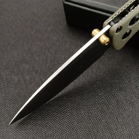 Close-up of the Razor Sharp 3-Inch Folding Pocket Knife with Coated Plain Edge Blade showcasing the sharp blade and handle.