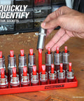Hand placing socket on Six Piece SAE And Metric Socket Tray Set For Quarter, Three Eighths, And Half Inch Drives Deep And Shallow Organizer