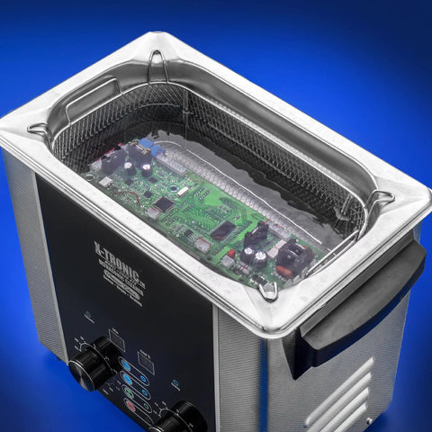 Commercial Ultrasonic Cleaner Platinum Edition 2.2 Liter Hella Tough Unit with circuit board inside stainless steel basket.