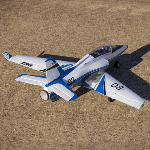Viper 30mm EDF RC Jet Airplane BNF Basic With Safe And AS3X Stability seen from rear angle on concrete surface.
