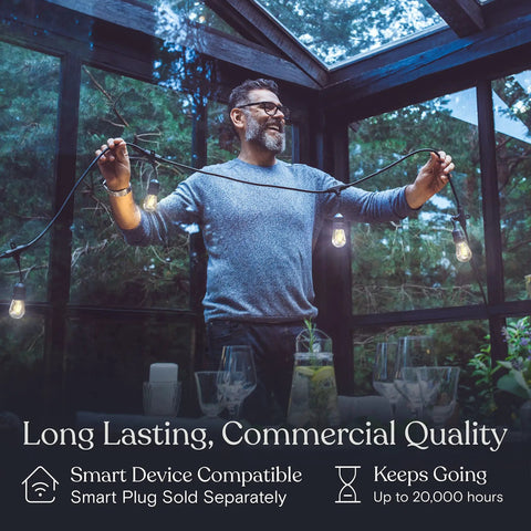 Man holding waterproof outdoor string lights 24 ft with 7 dimmable 2W vintage Edison bulbs, commercial grade patio lighting.