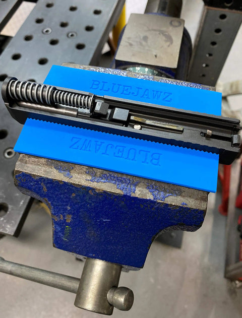 Heavy Duty Heat Resistant Magnetic Soft Jaws For Bench Vise Drill Press Clamps with blue jaws on a work vise setup.