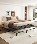 Heavy Duty Queen Size Box Spring With Low Profile Metal Frame And Thickened Steel Support Pillars For Wobble Free Mattress Foundation in a modern bedroom.