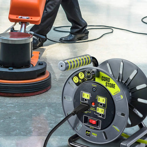 3 Foot Retractable Cord Reel With 4 Grounded Outlets, Safety Overload Breaker And Power Switch, 14AWG cable in use on job site