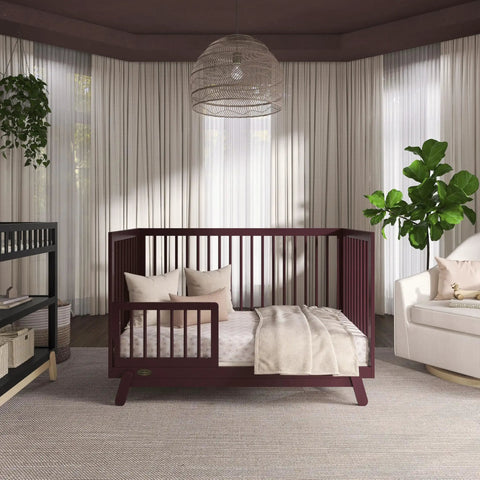 Dilian Toddler Guard Rail With Spindle For Crib To Toddler Bed Conversion Solid Wood Auburn shown in modern nursery