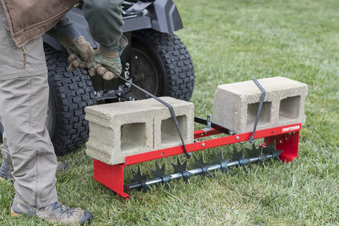 36-Inch Tow-Behind Spike Aerator For Lawns With 9 Galvanized Disks And An 80 Lb Weight Tray, Universal Hitch, attached to mower