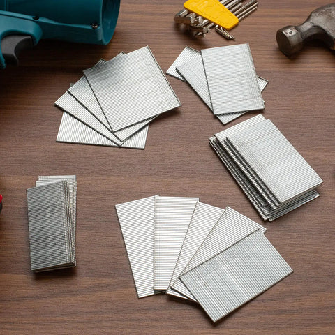 Top Shelf 5000 Count 16 Gauge Galvanized Finish Nails assorted lengths on a table for pneumatic and electric brad nailers.