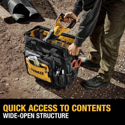 Person accessing tools from 18 Inch Rolling Tool Bag With 27 Pockets For Rough Jobsites IP54 Water Resistant Compartment Built Tough From 1680D Fabric And Dirt Repellent Tarpaulin Jobsite Ready And Ultra Organized