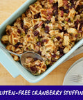 Gluten-free cranberry stuffing in a blue baking dish with spoon; Gluten Free Pancake And Baking Mix For Fluffy Pancakes, Waffles, Biscuits, And More Grab And Go Breakfasts Pack Of 6 16 Oz Each Ideal For Quick Easy Breakfasts, Snacks, And Desserts.
