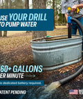 Heavy Duty Drill Powered Stick Water Transfer Pump Slams Through 160 GPM, draining water from a stock tank via a hose.