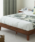 King Size Solid Wood Platform Bed Frame With Antique Espresso Finish And Integrated Headboard featuring a cozy bedding and slat support.