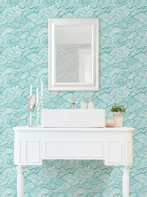 Saybrook Teal Peel And Stick Wallpaper With Aqua Wave Pattern For Renters And DIY Lovers in bathroom setting with mirror and vanity