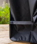 Close-up of black 80 Qt Universal Cooler Cover For Large Outdoor Rolling Coolers Weatherproof And Waterproof UV Resistant Heavy Duty Polyester