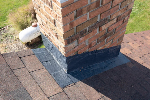 Brick chimney with waterproof sealant applied, showing Chimney Flashing Sealer And Roof Sealant That Keeps Water Out, 2.2 kg.