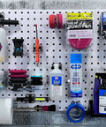 LockHook Steel Pegboard Hook Set 63 Piece Garage Organization Kit For LocBoard with tools and cleaning supplies organized.