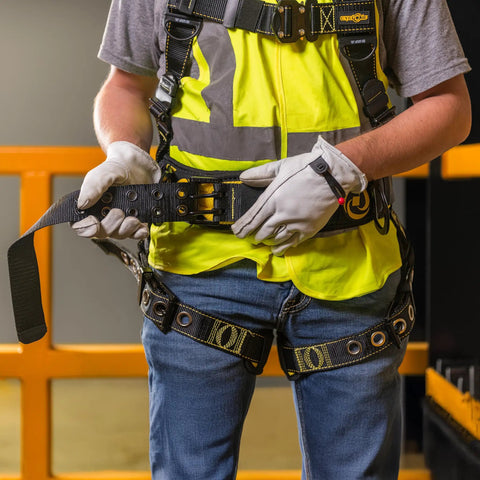 Person fitting All Day Comfort Safety Harness With Waist Pad And Side D Rings For Worksite Use Boss Level OSHA ANSI Compliant
