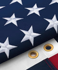 Close-up of US Flag 3x5 Outdoor Heavy Duty Nylon With Fade Resistant Embroidered Stars And Sewn Stripes Brass Grommets Built To Last In Any Weather