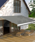 12x10 Ft Manual Retractable Outdoor Patio Awning With Easy Crank Handle Windproof And UV Protected Sun Shade Canopy mounted on house