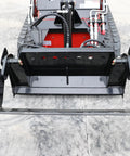 Front view of Mini Skid Steer Loader 1800 Lb Capacity With Four In One Bucket Attachment on concrete surface.
