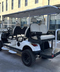 Smooth 48V Lithium Golf Cart Sightseeing Patrol Rig With Solid Double Wishbone Suspension 4Kw Motor 10 Inch Touchscreen Sound System And Premium Headrest Seats For Great Park Cruising, showing rear seating and dashboard.