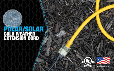 Polar Solar Extra Heavy Duty Outdoor Extension Cord in yellow, shown on mulch with a lighted end, 100 feet long, SJEOOW jacket.