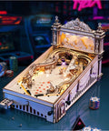 Miniature Pinball Machine Puzzle Kit For Adults With 3D Wood Model Design And Scoring Sound Lights illuminated on desk