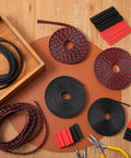 96ft Braided Cable Sleeve Kit With 6 Expandable Sleeves And 127 Heat Shrink Tubes in black and red on a wooden table