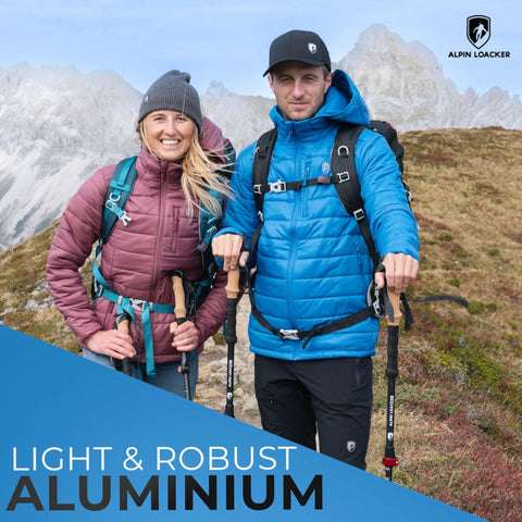 Two hikers with Ultra Lightweight Aluminum Collapsible Trekking Poles With Cork Grips, Adjustable 39 To 47 Inches, on a mountain trail.