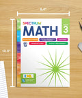 Third Grade Math Workbook for Kids Ages 8 To 9 Master Multiplication Division Fractions Addition And Subtraction shown with pencils and eraser