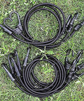 32 Inch Heavy Duty Bungee Cords With Hooks 8mm Elastic Rope on grass, S hooks visible, suitable for outdoor camping, cargo securing.