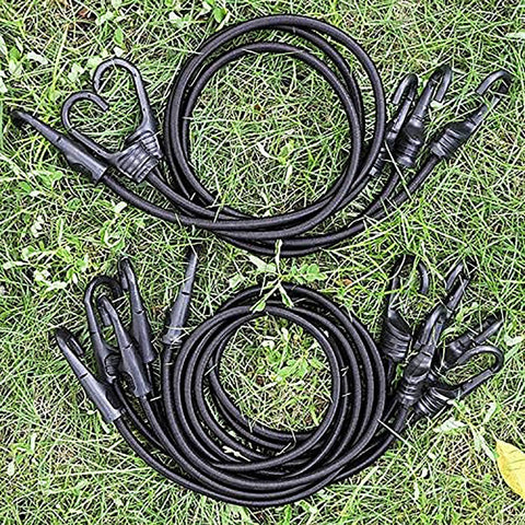 32 Inch Heavy Duty Bungee Cords With Hooks 8mm Elastic Rope on grass, S hooks visible, suitable for outdoor camping, cargo securing.