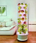 All In One Vertical Hydroponic Garden Tower With LED Grow Lights, Eight Levels, Thirty-Two Large Pods, Indoor System in living room