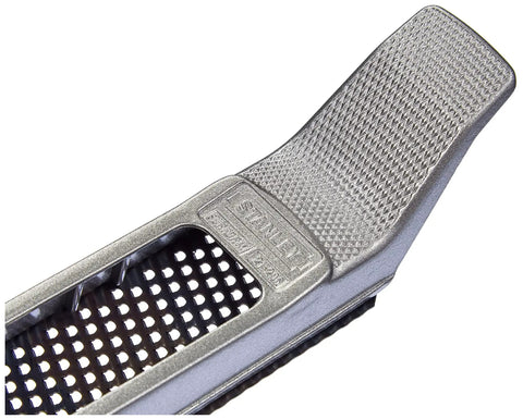 Close-up of metal body surform plane for precision shaping and smoothing, 11.8 inch hand tool with interchangeable blades, 300 mm length.