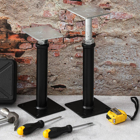 Two Pack Adjustable Floor Jack Posts 9.5 To 13.5 Inch Height Durable Carbon Steel Screw Posts on workshop floor with tools